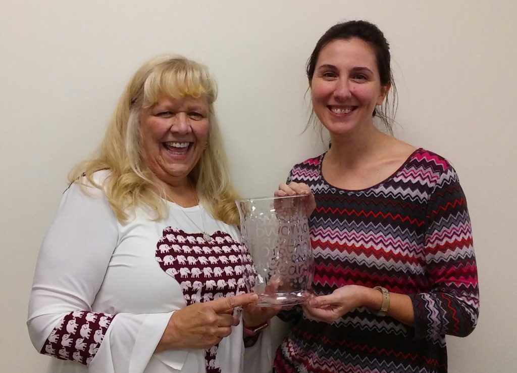 Sandy Stiltner and JoBeth Wampler receive the "Clubwoman of the Year - 2018" award.