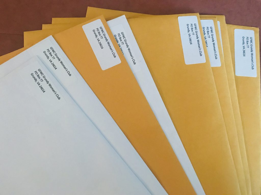 Envelopes filled with 2018 reports, ready for mailing to their respectively district chairmen.
