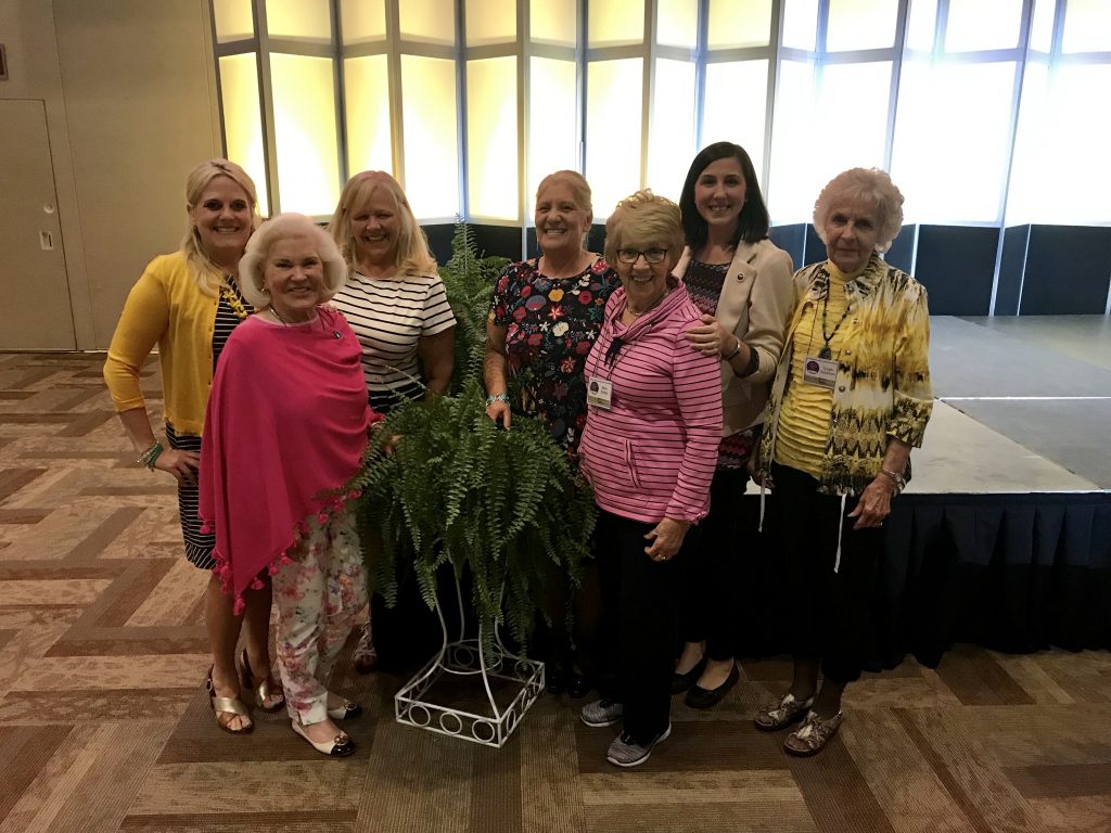 Grundy Woman's Club members – from right, Ginger Robertson, JoBeth Wampler, Betty Shields, Diane Lynch, and Sandy Stiltner – were joined by Women in Entrepreneurship Conference keynote speaker Martha Ann McGlothlin Bowman (far left) and her mother, Carol.