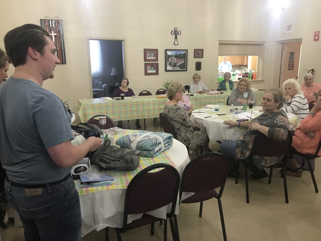 Fred Clevinger, 2019 Grundy High School graduate, thanks clubwomen for the gifts he received at the College Shower, which was held this year at Buchanan First Presbyterian Church in Grundy.